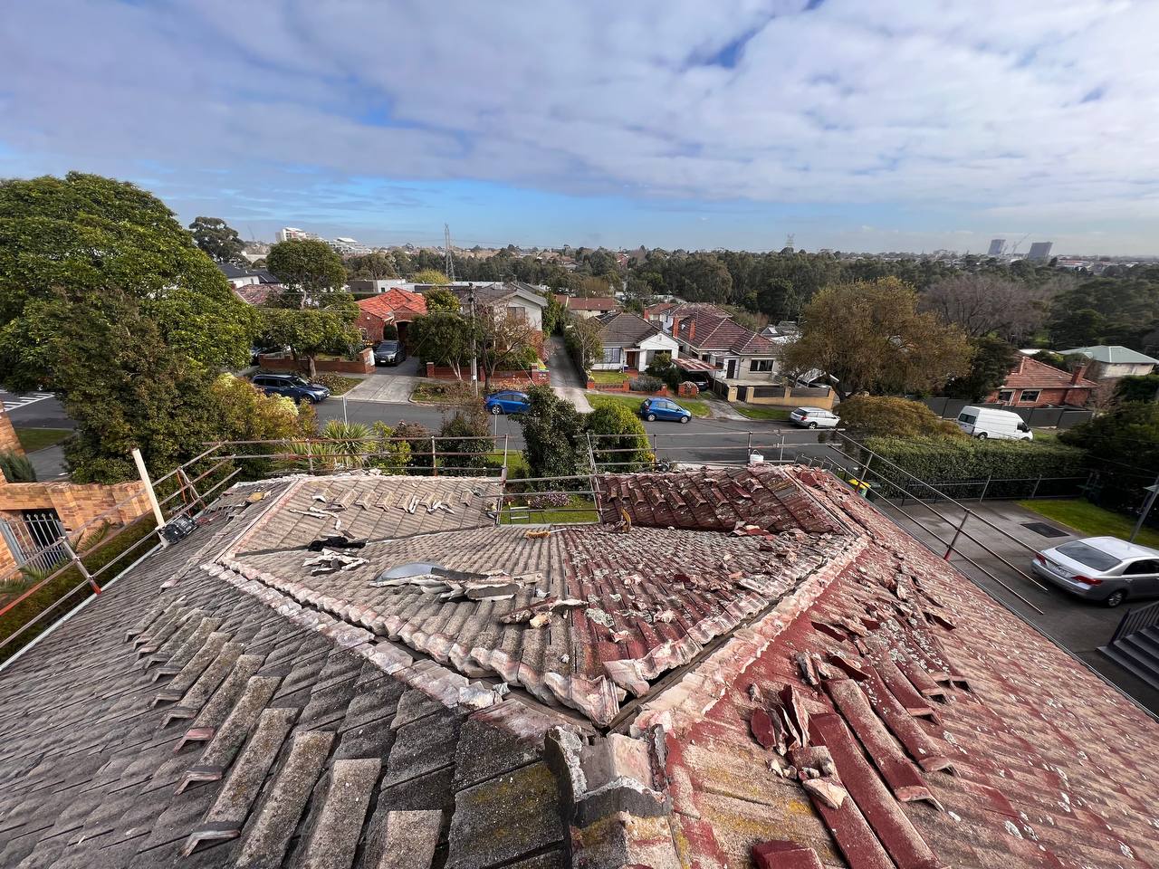 Roof repair work in progress - tile roof replacement in Melbourne
